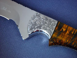"Golden Eagle" obverse side front bolster engraving detail. Engraving is full and leafy in this four power enlargement. Look close, you can see the reflectionof the camera tripod and my red shirt in the bolster mirror polish!