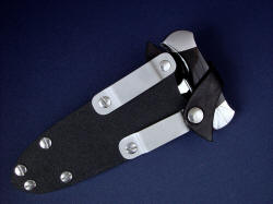"Grim Reaper" in kydex sheath, reverse side view. Die formed aluminum belt loops are reversible and can be positioned several locations along the sheath welt frame.