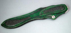 "Ishi" sheath back detail. Full inlays of green stingray skin in green dyed leather shoulder, hand-toold and stitched