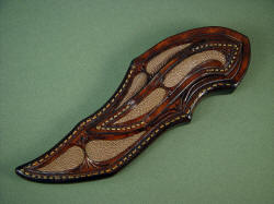 Izanami sheath back detail. Note multiple inalays of tan rayskin in hanc-carved leather shoulder. 