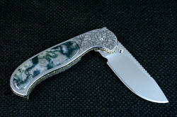 "Izar" linerlock folding knife, reverse side view. Knife has great lockup, excellent dentent pulling it and holding it closed.