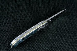 "Izar" linerlock folding knife, spine edgework, filework detail. Even titanium spring plate is fileworked fully