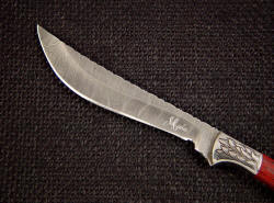 "Kineau" obverse side damascus knife blade detail. Blade is hollow ground with nice recurve shape