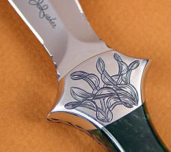 "Little Venus" obverse side bolster engraving detail. Note twisted leaf motif to compliment dagger shape.