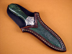 "Little Venus" sheathed view. Note sheath allows display of handle and bolster, yet protects blade. Note matching frogskin inlay