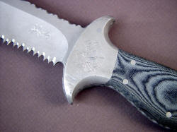 "Macha" PSD combat tactical knife after deployment in battle, bolster close up detail. Note scuffing on bolster faces where sheath contact is made. 