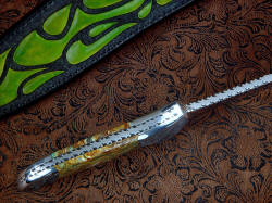 "Macha Navigator EL" spine edgework, filework detail. Blade tang and spine is thick and strong, filework is regimented and accurate along spine