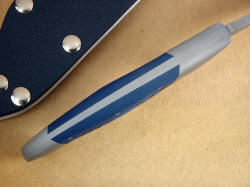 "Mercury Magnum" spine view; note fully tapered tang with no filework to trap debris, full handle domed for comfort.