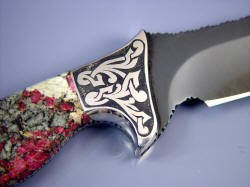 "Mercury Magnum" reverse side front bolster engraving detail. Design incorporates curves and angles of knife blade and handle