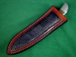 "Mule" sheath is simple and elegant, with black frog skin inlays in hand-carved leather shoulder, hand-stitched