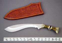 "Nasmyth" khukri, scale photo. This is a big, sharp, and beautifully ground and finished custom khukri, with elegant llines and stunning handle materials