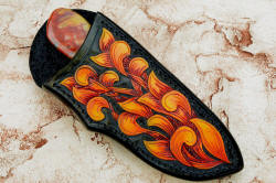 "Nunavut" sheathed view. Sheath pattern is hand-cut, hand-tooled, hand-dyed in numerous steps with micro-brushes for an antiqued, colorful rendition of the Victorian engraving on the bolsters and tonal quality of the gemstone handle