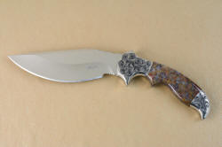 "Orion" obverse side knife view. This is a curvaceous blade and handle, with a near "gun" grip orientation of handle to blade for wrist relief