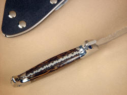 "PJLT" inside handle tang detail. Knife is mirror polished stainless steel throughout