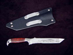 "PJLT Dragon" reverse side view.  Sheath has durable aluminum belt loop constrction, knife blade and bolster embellishment matched on both sides