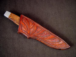 "Paraeagle" custom tactical, CSAR knife in hand-carved leather sheath. Straightforward design is clean and neat.