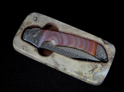 Open case for "Procyon" folding knife in brown Breccia Marble 