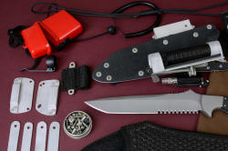 "Raijin" accessory detail. In this photo: Horizontal reversible belt loop plates, stainless hardware package, LIMA web and strap mount for Sliltaire LED Maglite, MagTac clip, water resistant accessory container, 550 cord and SCUBA rated lanards, locking knife sheath