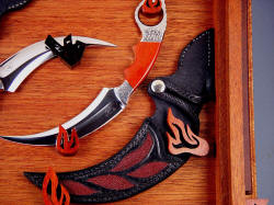 "Raptors" (Tunguska and Manicouagan) note bolster engraving matches bloodwood hand-carved hangers. 