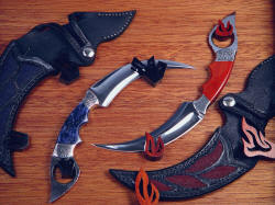 "Raptor" kerambits in case. Hangers are ebony and bloodwood, all color of woods is natural, all pieces are hand-carved