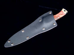 SWAT Hybrid knife, sheathed view. Sheath is tension model in kydex, aluminum frame, blued steel Chicago screws