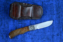"Sadr" linerlock folding knife, reverse side view. Sheath back fits standard belt sizes, is hand-stitched with polyester for strength and durability