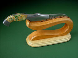 "Saussure" custom chef's knife in stand. Lines of knife and stand flow well, art with a purpose