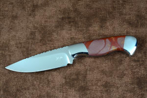 "Secora" knife profile, obverse side view  in T3 deep cryogenically treated 440C high chromium martensitic stainless steel blade, 304 stainless steel bolsters, Mookaite Jasper gemstone handle, hand-carved leather sheath inlaid with burgundy ostrich leg skin