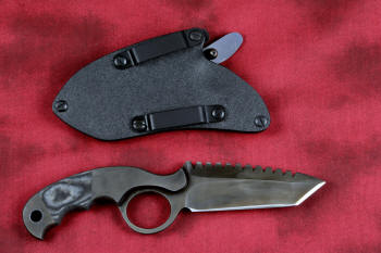 "Skeg"  tactical, counterterrorism, crossover knife, reverse side view in ATS-34 high molybdenum martensitic stainless steel blade, 304 stainless steel bolsters, black and gray G10 fiberglass/epoxy composite handle, hybrid tension tab-locking sheath in kydex, anodized aluminum, black oxide stainless steel and anodized titanium