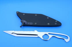 "Synan" counterterrorism combat tactical dive knife, reverse side view showing front face of sheath and cam-lock mechanism made of grayed and passivated 304 stainless steel and anodized titanium springplate. Camlock allows retention to clear serrations while being sheathed or unsheathed.