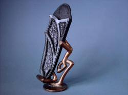 "Tharsis Intense" sheath and stand, demonstrating singular work of art that is a sheath with bold patterns and texture of natural materials and hand-cast bronze scultpture