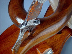 "Tribal" knife rest in sculptural display stand. Woods are complimentary in color to knife handle