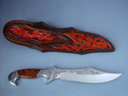 "Tribal" Helhor knife, reverse side view. Sheath is tooled in back with hand-carving, dying, and hand-stitched, even in the belt loop
