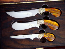 "Trophy Game Set" close case dedtail. Red oak is antiqued, durable, and houses knives well