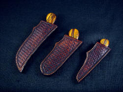 "Trophy Game Set" sheathed view. Sheaths are protective and well made