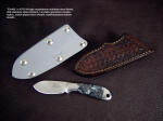 "Firefly"obverse side view in ATS-34 high molybdenum stainless steel blade, 304 stainless steel bolsters, Larvikite gemstone handle, hand-stamped leather sheath, kydex, nickel plated steel, nickel silver sheath