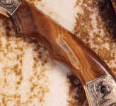 Rhodochrosite gemstone custom handmade knife handle. Most rhodochrosite is bright pink, this is brown.