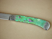 Ruby in Fuchsite is real ruby gemstone in Fuchsite, a softer matrix, making this a difficult handle to finish