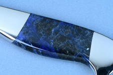 Sodalite shows bright shimmer, unable to represent in photos