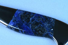 Sodalite, without white reflector above handle shows a more proper rendition of color and depth