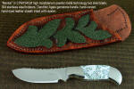 "Menkar" obverse side view in CPM154CM powder metal technology tool steel blade, 304 stainless steel bolsters, Dendritic Agate gemstone handle, hand-carved, hand-dyed leather sheath inlaid with green rayskin