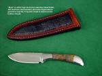 "Mule," Obverse side view in 440C high chromium stainless steel blade, 304 stainless steel bolsters, Bronzite Hypersthene gemstone handle, Frog skin inlaid in hand-carved leather sheath