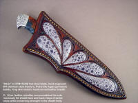 Sheath detail: "Altair" with frog skin inlay, Pietersite gemstone handle, engraved stainless steel bolsters
