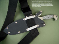 "Horrocks" combat tactical knife with locking sheath and tactical sternum harness allowing wear of the knife handle down across the chest