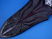 "Vesta" detail of front sheath face dozen inlays of black rayskin in black cherry dyed leather shoulder