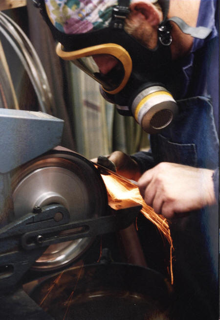 Grinding blade steel on a belt grinder