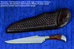 "Sonoma" professional chef's knife, obverse side view in 440C high chromium stainless steel blade, 304 stainless steel bolsters, Pilbara Picasso Jasper gemstone handle, hand-tooled burgundy leather shoulder sheath