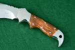 Beautiful and hard Amboyna burl hardwood on this tactical knife handle